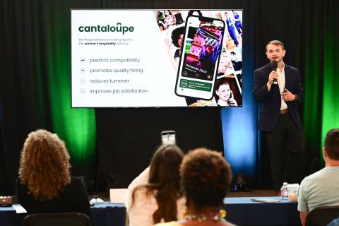 photo of Rich Simmerman presenting cantaloupe during a Lepage Center Pitch Friday event